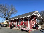 The restored Wyckoff Station building showing its true red colors just before the train arrives